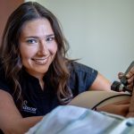 Grace Gleba examines a patient at Montclair’s Audiology Clinic.