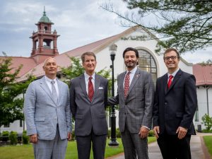 From left: Jeff Strickland, executive director of the John Martinson Honors EDGE Program, John Martinson, University President Jonathan Koppell, and Montclair honors student Jacob Roby.