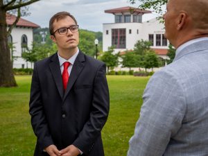 Student Jacob Roby talks with Professor Jeff Strickland.
