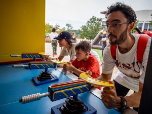 People playing a carnival game
