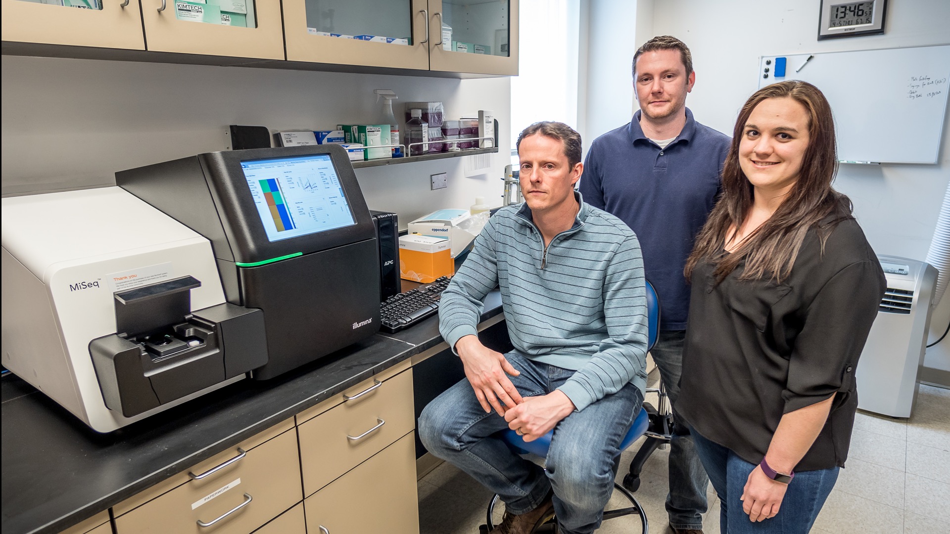 Professor Robert Meredith and staff near the Next Generation Sequencing Platform.