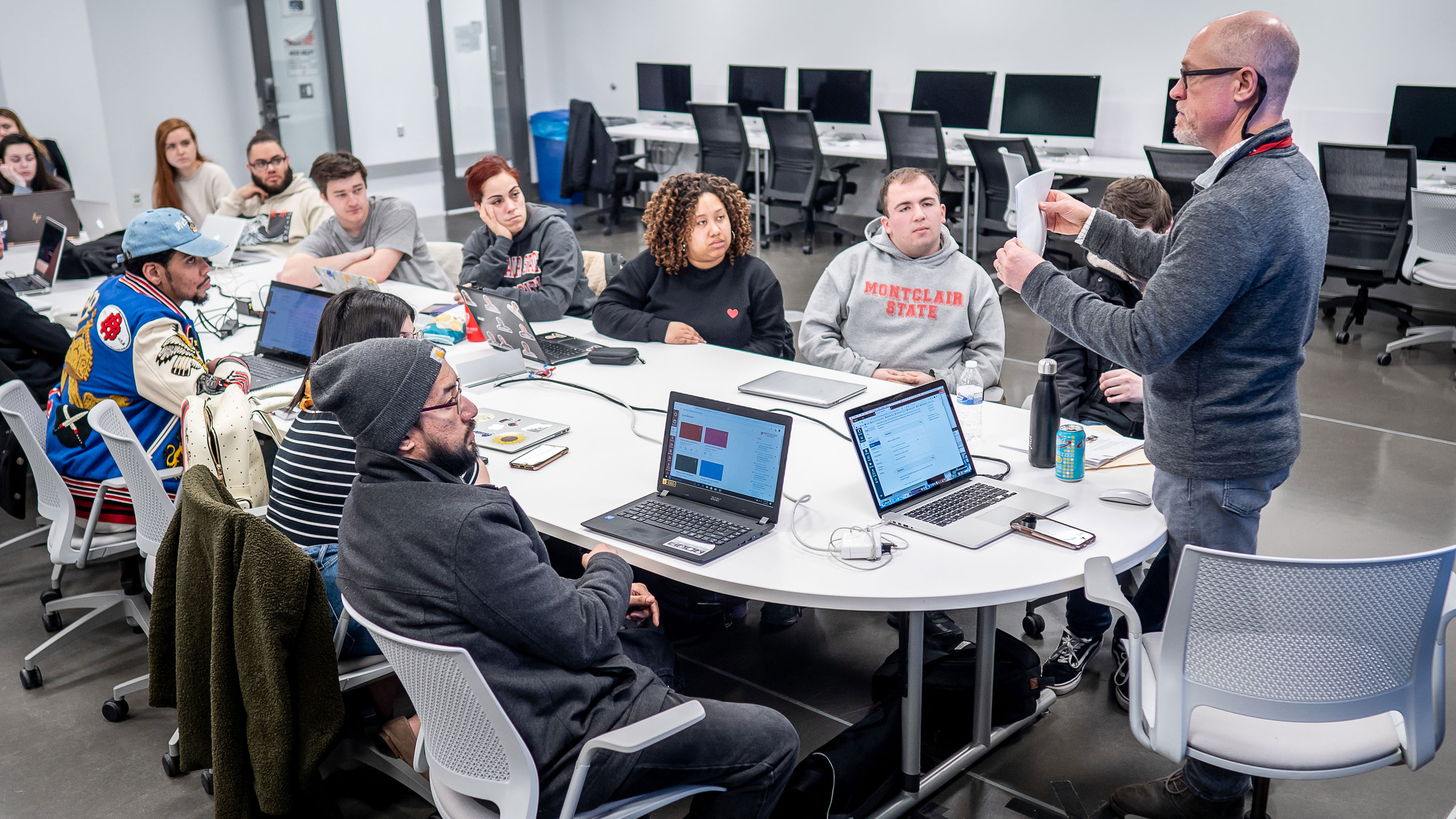 Tom Franklin in front of classroom