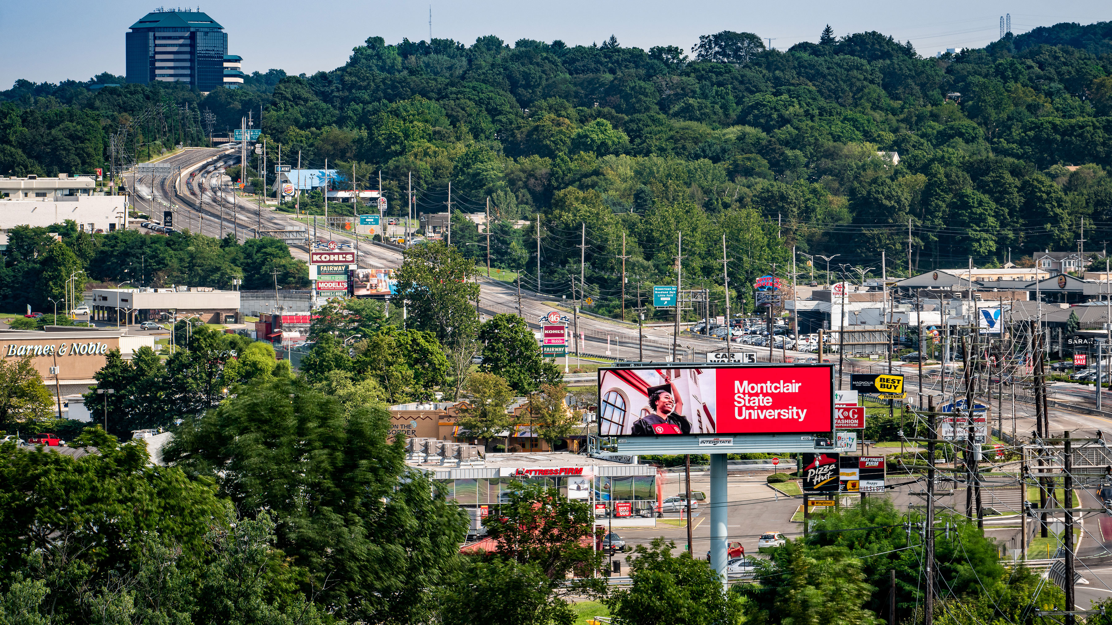 University billboard on Route 46 near campus