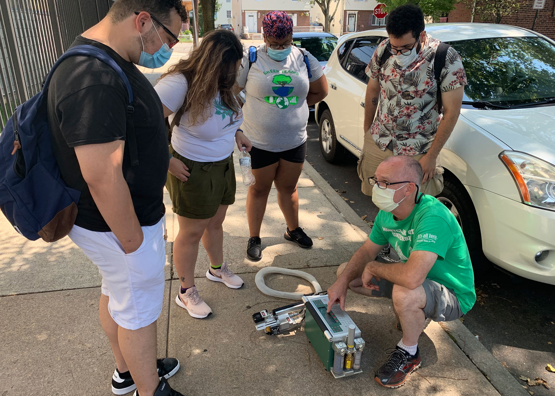 professor explaining how to use equipment