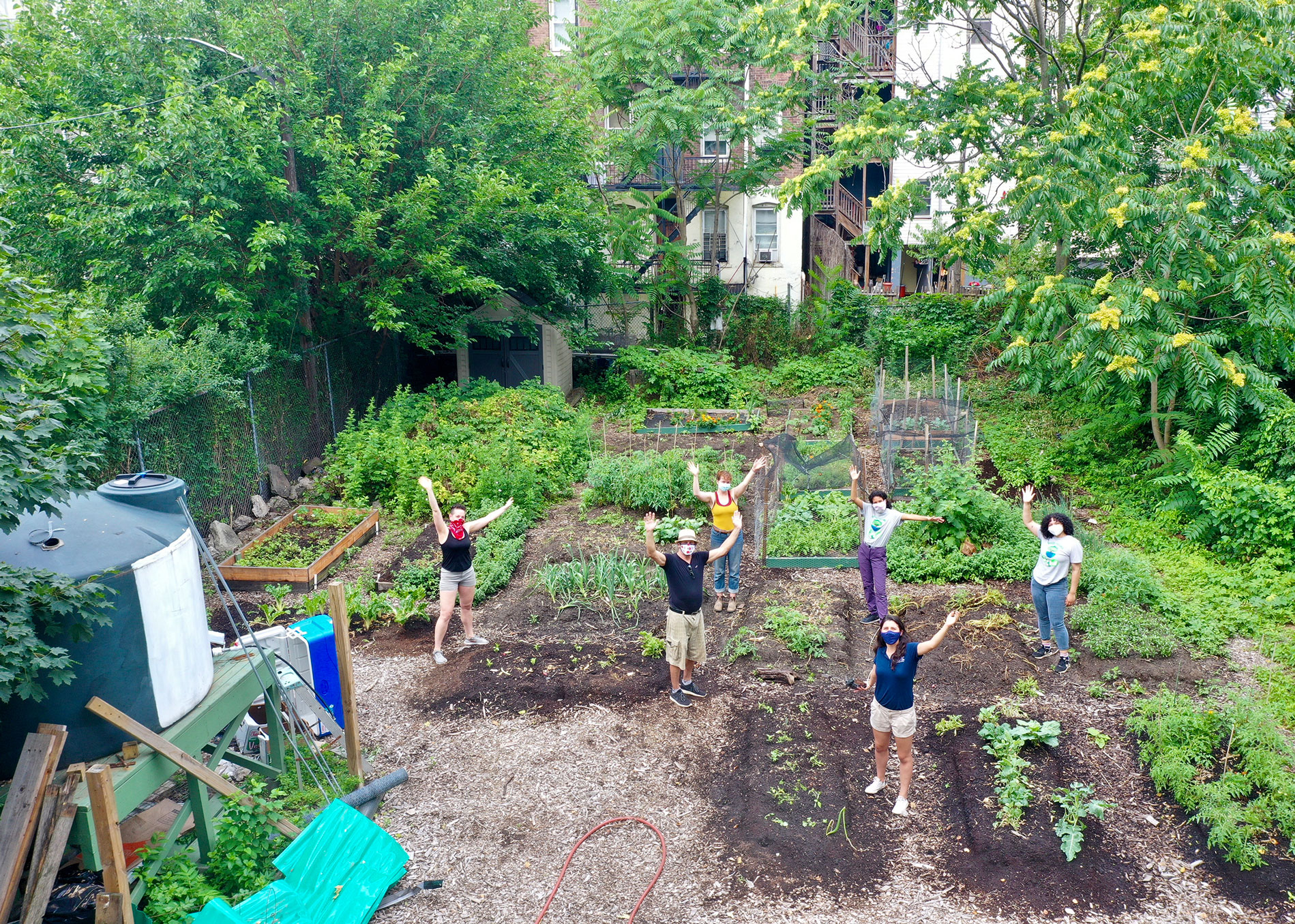 students gardening group photo