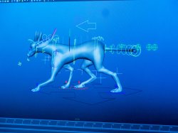A photo of a computer screen with a 3D image of a dog on a bluescreen