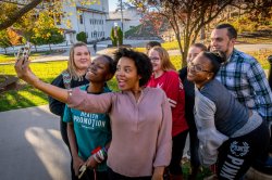 Photo of a group of students taking a selfie.