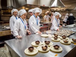 Photo of student chefs making desserts