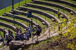 Students attend class in the Amphitheater on Montclair campus