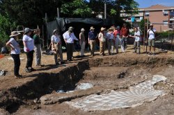 Restorer Roberto Civetta and Professor Chatr Aryamontri show a mosaic found at the Villa of the Antonines to Field School students.