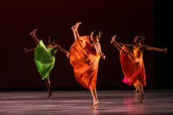 Dance students perform onstage.