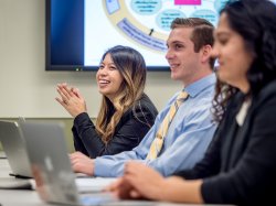 students smiling in class