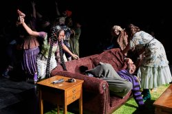 actors on stage in costume