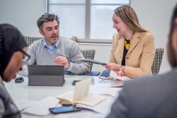 Professionals discuss a project at Montclair State University.