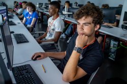 A student works at a computer on the campus of Montclair State University.