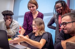 Students and faculty collaborating on hands-on research projects.