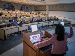 Computer Science professor giving a lecture to their students.