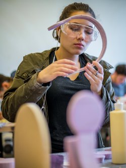 industrial design student constructing a mock-up