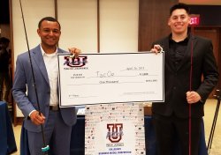 students with large check from UPitchNJ