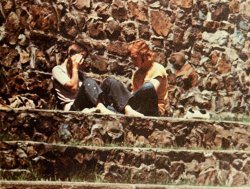 Two students hanging out at the amphitheater