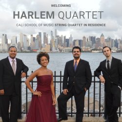 Photo of the Harlem Quartet posing in front of the Hudson River with New York Skyline in the background