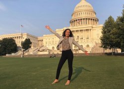 Photo of Isabella Paz Baldrich on the lawn in front of the U.S. Congress building