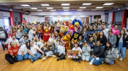 Rocky and mascots celebrating with students