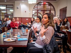 Woman talking in audience