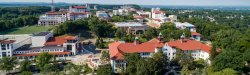 Aerial view of Montclair State University campus and beyond on a sunny day