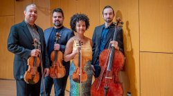 Ilmar Gavilán (violin), Jaime Amador (viola), Melissa White (violin) and Felix Umansky (cello) of the Harlem Quartet. (Photo by Mike Peters)
