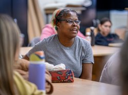 Art Education students look on with interest during their session with sculptor, Gabriel Koren.