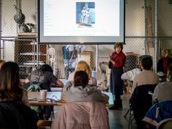 Gabriel Koren shows a slide of her piece, Prudence Crandall and Student, which is displayed in the Connecticut State Capitol.