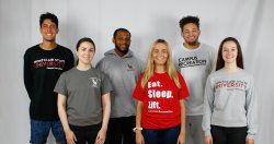 six students modeling campus recreation gear