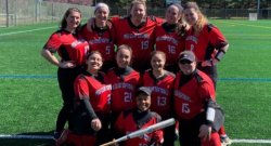 Ten montclair state university club softball players psoing for a team photo
