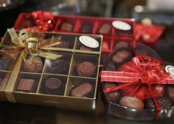 Chocolate maker Richard Cadbury began packaging his company's chocolate confections in heart-shaped boxes in 1861.