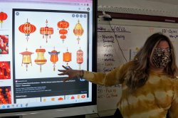 Alumna Ashley Agresti teaching in the classroom