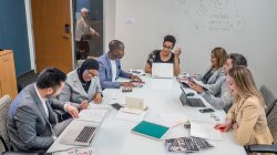 Professionals meeting at a conference table