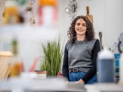 Allison Abrom stands in a food hall at Montclair.