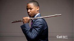 Man with flute over shoulder