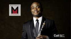 Man smiling with clarinet