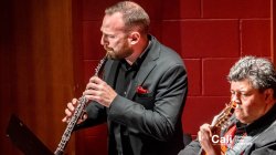 Oboe player with guitar player 