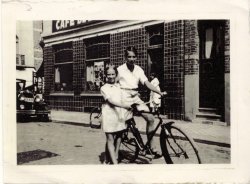 Eva and Heinz Geiringer on bicycle