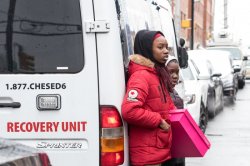 Photo of Children watching events unfold after Jersey City shooting in December 2019