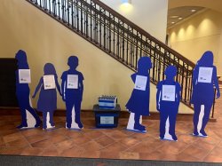 Photo of MIGHT Installation of Blue "People" in University Hall