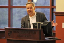 Fernando Naiditch, panel coordinator and professor at Montclair State University, gives an introduction at the immigration symposium.