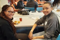 Photo of two students at the Holmes Honors Alumni Mentoring Program Gathering