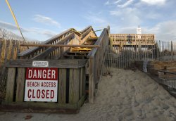 A garbage can blocks the entrance to the beach on the corner of Osborne Avenue and East Avenue on Tuesday, April 7, 2020 in Bay Head. NJ. The town has closed down the beaches due to the coronavirus pandemic.Scott Faytok | For NJ Advance Media