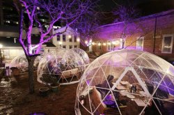 Customers dine inside bubbles at Fig &amp; Lilly Garden in Morristown, NJ