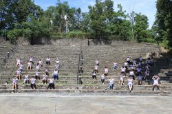 volunteers on amphitheater steps