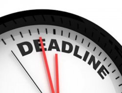 clock with the word "deadline" at 12 o'clock